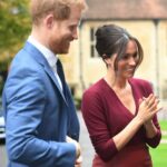 Duchess of Sussex in Red Pencil Skirt for Roundtable Discussion at Windsor Castle