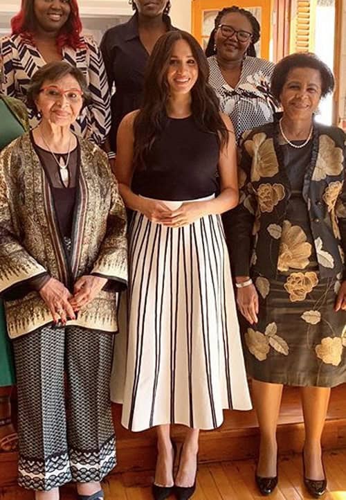 Meghan Markle s 10 Best Pleated Skirt Style Moments Dress Like A